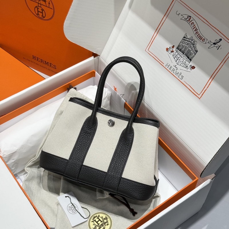 H**mes shopping bags